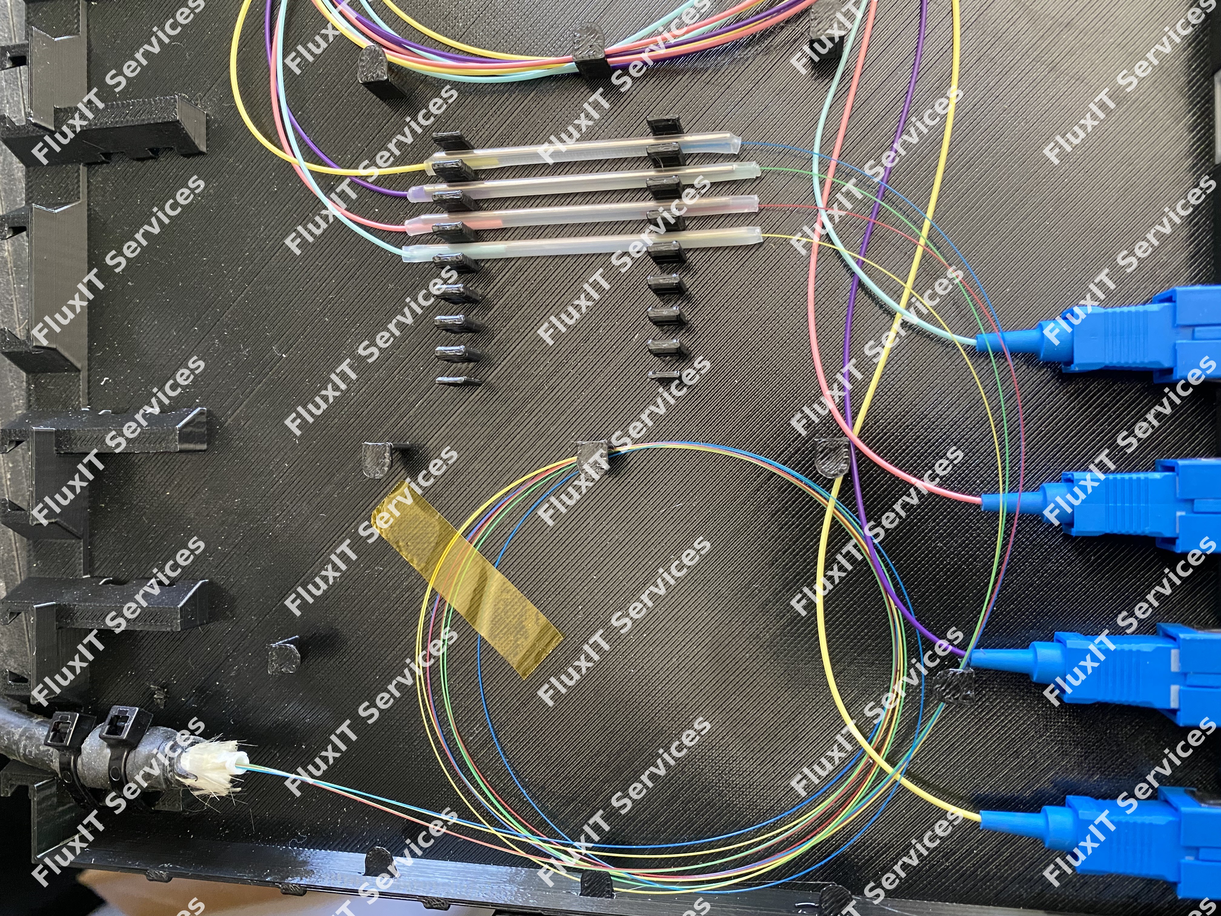 Singlemode Fiber Splicing in Custom FluxIT Patch Panels and Splice Trays
